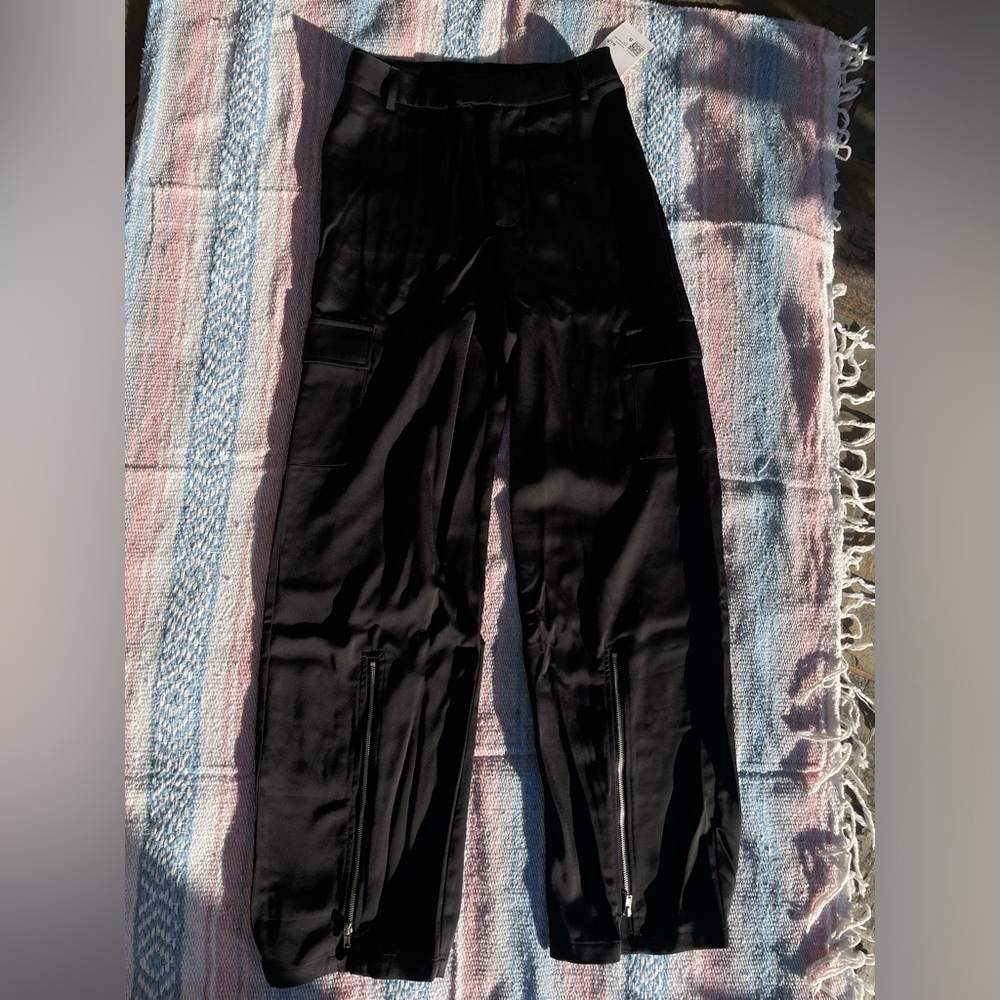 Women’s black satin cargo pants with zippers